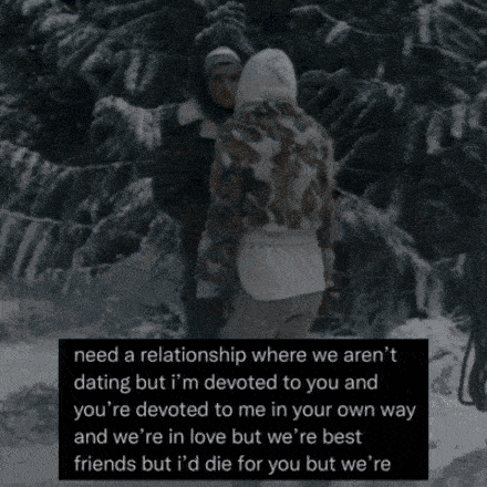 a man and a woman are standing in the snow with a quote about a relationship