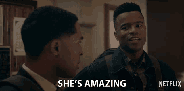 a man says she 's amazing next to another man in a netflix ad