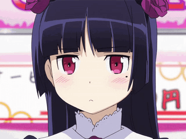 a close up of a girl 's face with a sign in the background that says t-b