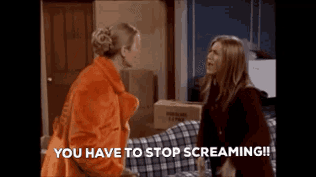 two women are standing next to each other and one of them is saying you have to stop screaming