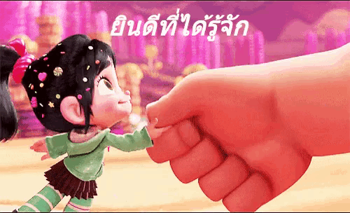 a cartoon girl is being touched by a person 's hand in a foreign language .