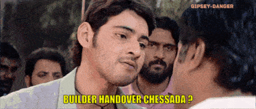 a man talking to another man with builder handover chessada written on the bottom