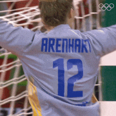 a soccer player with the number 12 on his back
