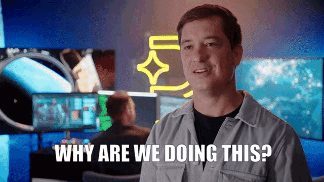 a man says " why are we doing this " in front of a neon sign