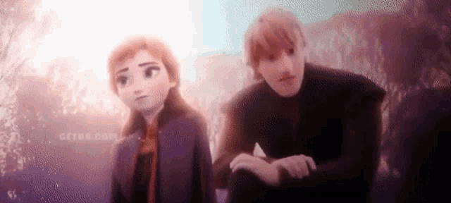 anna and kristoff from frozen ii are sitting next to each other in a forest .