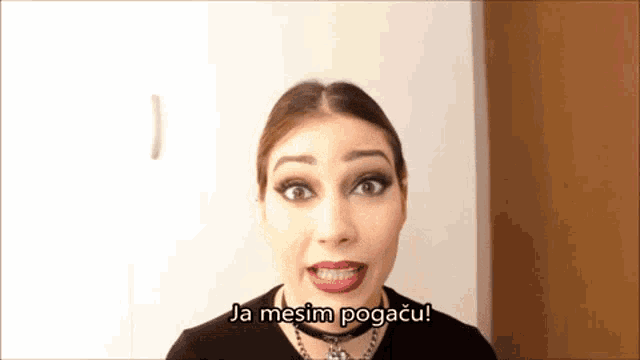 a woman with braces on her teeth is making a funny face and says ja mesim pogacu