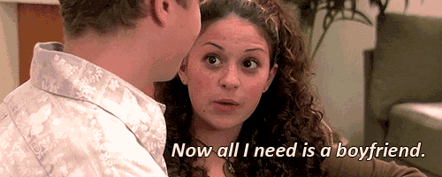 a woman says " now all i need is a boyfriend " to a man
