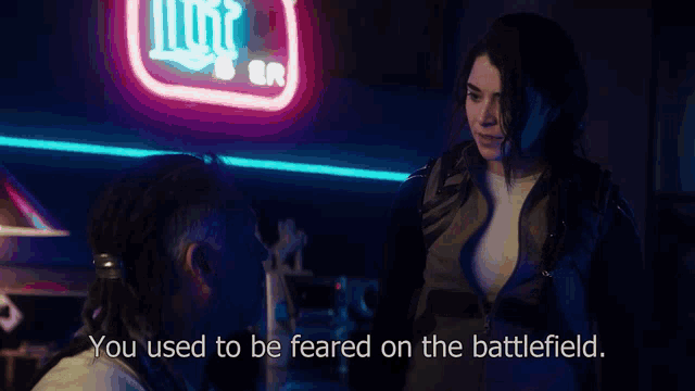 a woman talking to another woman with the words you used to be feared on the battlefield visible