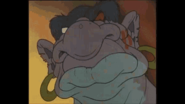 a close up of a cartoon character 's face with a snake around its neck .
