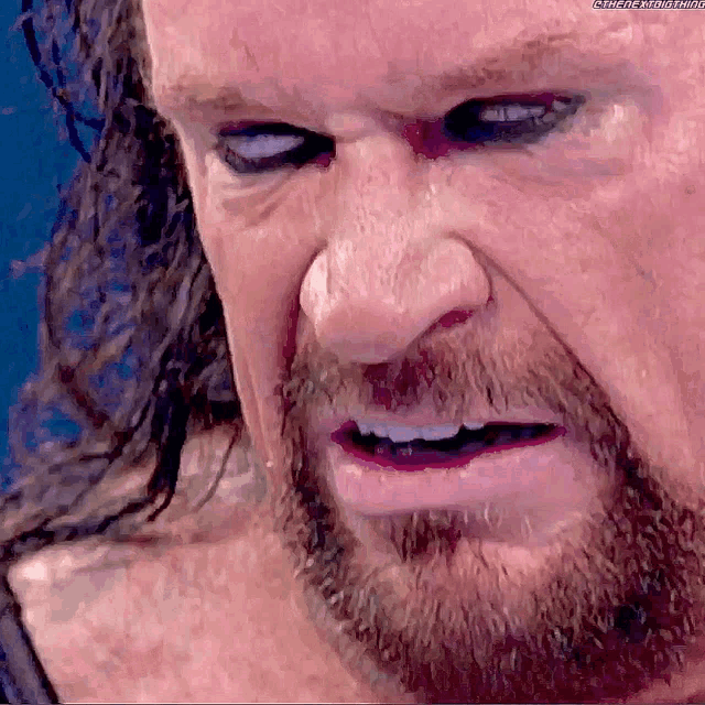 The Undertaker Rolls Eyes GIF - The Undertaker Rolls Eyes Smack Down GIFs