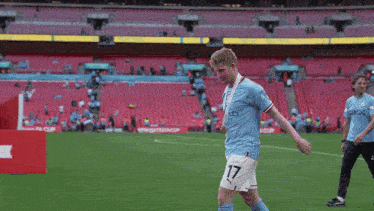 a soccer player with the number 17 on his shirt