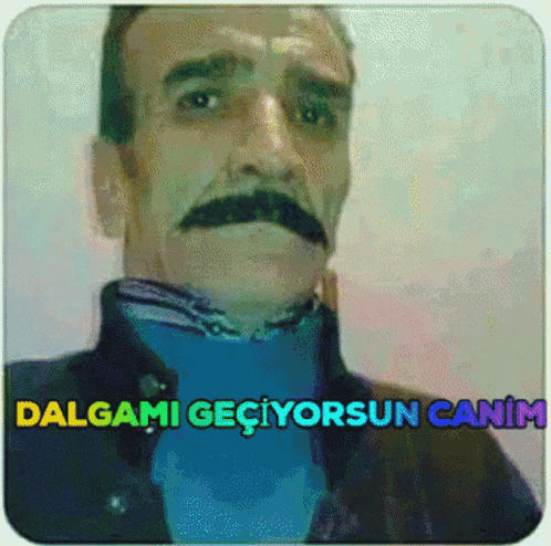 a picture of a man with a mustache and the words " dalgami geciyorsun canim "
