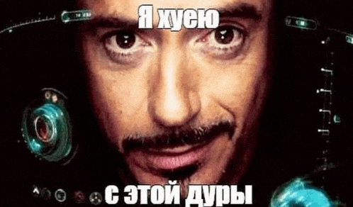 a close up of a man 's face with a mustache and a caption .