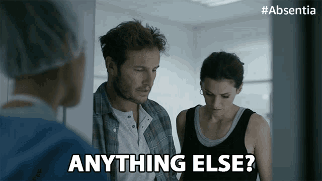 a man and a woman are standing next to each other and the woman is asking anything else