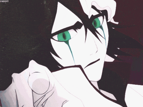 a close up of a person 's face with the name sasori written on the bottom