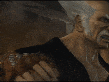 two men are fighting in a video game and one is wearing a black shirt