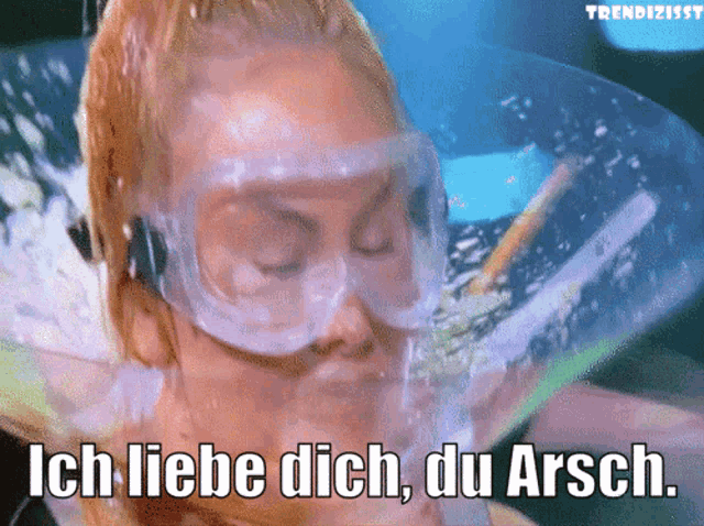 a woman wearing goggles with the words ich liebe dich du arsch below her