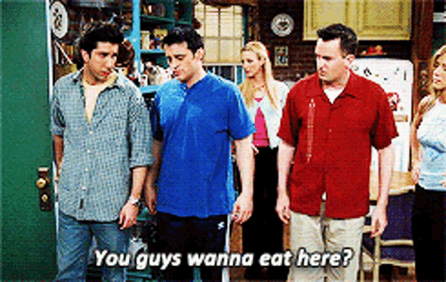 a group of people standing next to each other with the words you guys wanna eat here on the bottom