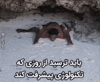 a man is crawling in the sand on the beach