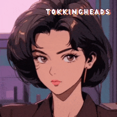 a close up of a woman 's face with the words tokingheads written above her