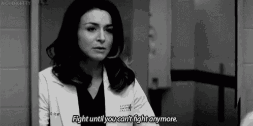 a black and white photo of a woman in a lab coat with the words fight until you can 't fight anymore