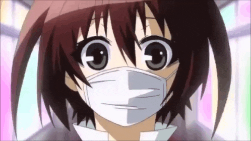a close up of a girl wearing a mask with the letter g on her face