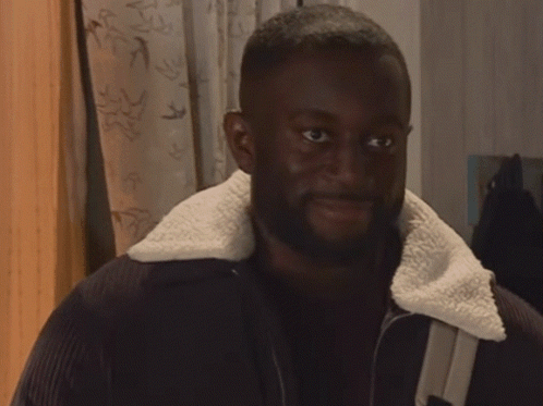 Moses Smiles And Sways Coronation Street GIF - Moses Smiles And Sways Coronation Street Corrie GIFs
