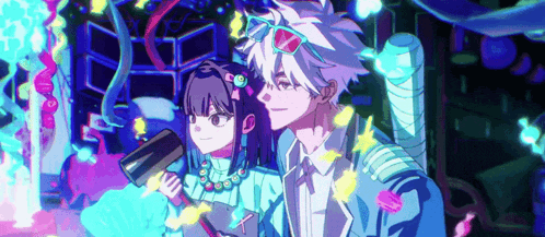 a boy and a girl are standing next to each other .