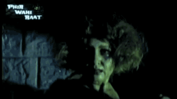 a close up of a woman 's face with a sign that says phir wahi raat in the background