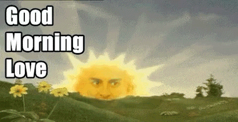 a good morning love greeting card with a sun with a face on it in a field .