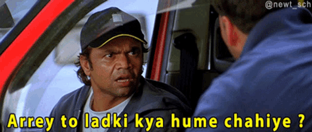 a man in a baseball cap is talking to another man in a car with the caption arrey to ladki kya hume chahiye