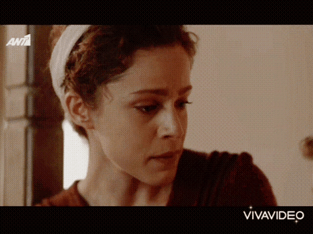 a close up of a woman 's face on a tv screen with vivavideo written on the bottom
