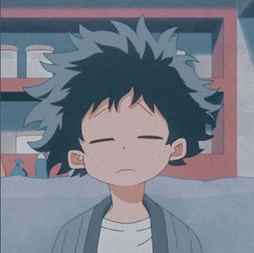 a close up of a person 's face with their eyes closed and a shelf in the background