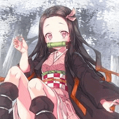 a girl in a kimono is sitting on a chair in a forest .