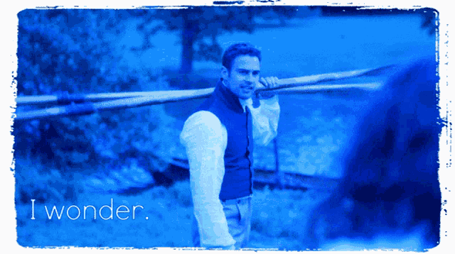 a picture of a man carrying a sword with the words i wonder below it
