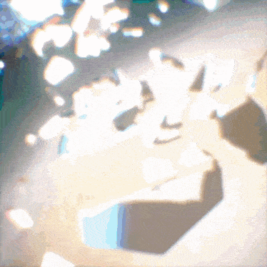 a blurred image of a person 's shadow on a white surface