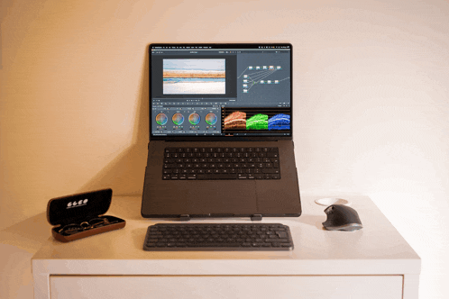 a laptop with a screen that says ' adobe premiere pro ' on it