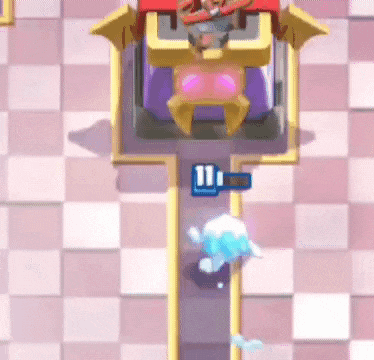 a video game is being played on a pink and white checkered floor with a number 11 in the corner .
