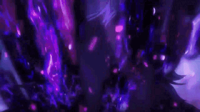 a close up of a person 's face in a dark room with purple and blue lights .