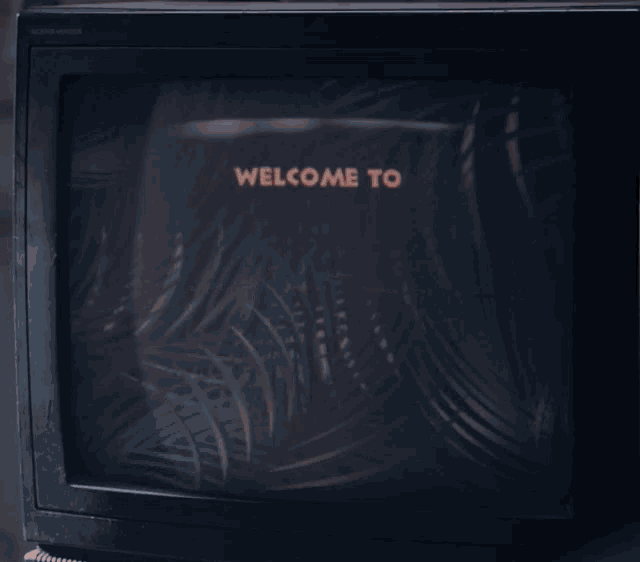 a television screen says welcome to jumanji on it