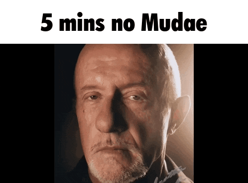 a close up of a man 's face with the words 5 mins no mudae above it