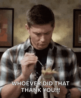 a man in a plaid shirt is eating food with a fork and says `` whoever did that thank you '' .