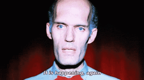 a bald man in a blue shirt and red bow tie says it is happening again