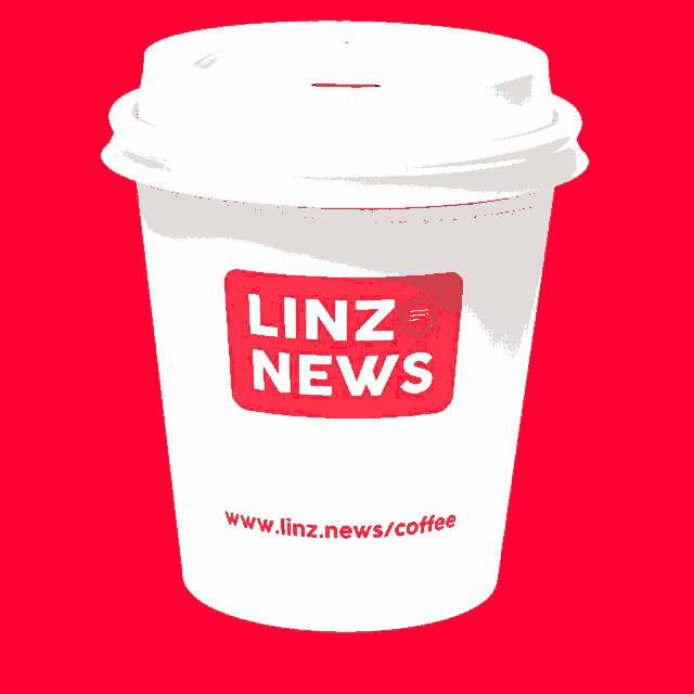 a white coffee cup with linz news on it