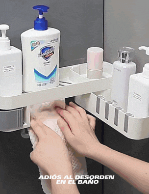 a person is holding a towel in front of a shelf with bottles of lotion and shampoo on it