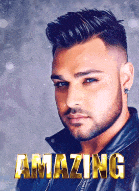 a man with a beard stands in front of a poster that says amazing