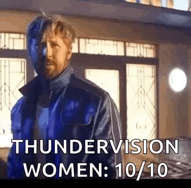 a man in a blue jacket is standing in front of a window with the words " thundervision women : 10 / 10 "