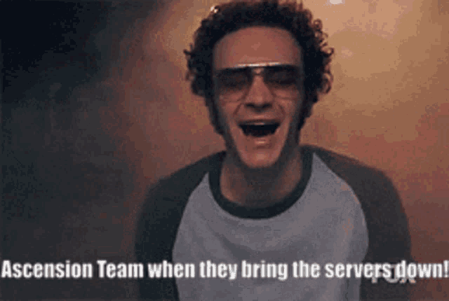 a man wearing sunglasses is laughing with the words ascension team when they bring the servers down written below him