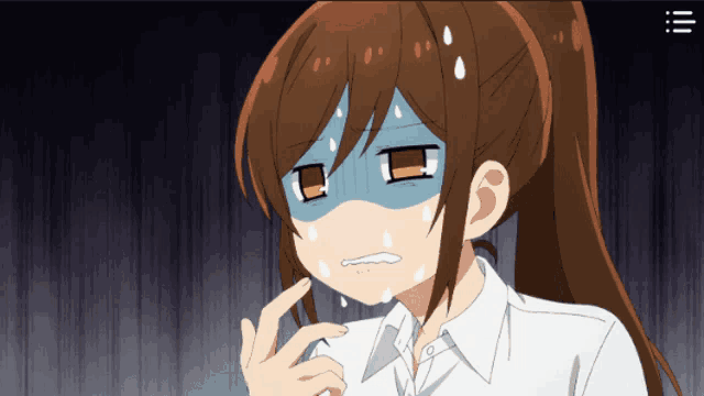 a girl with a blue mask on her face has tears running down her face
