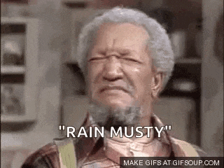 a man with gray hair and a beard is making a face and saying `` rain musty '' .